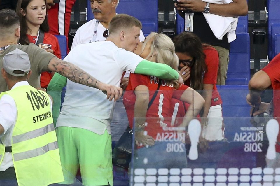 Jordan Pickford kisses girlfriend Megan Davison following the 2018 FIFA World Cup Russia Quarter Final match 