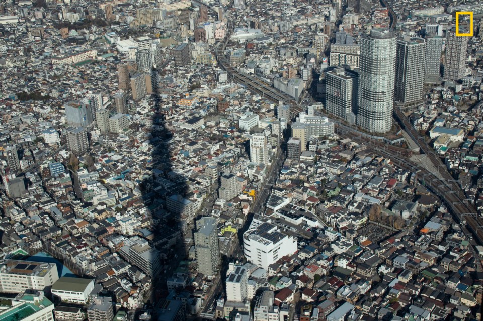  This picture was taken by Marc Woo, who said: 'I was at the top deck of Skytree around noon—when I looked outside, I noticed the shadow of Skytree and the street intersecting like hands on a clock face. I was also amazed by how many homes are there under the Skytree'