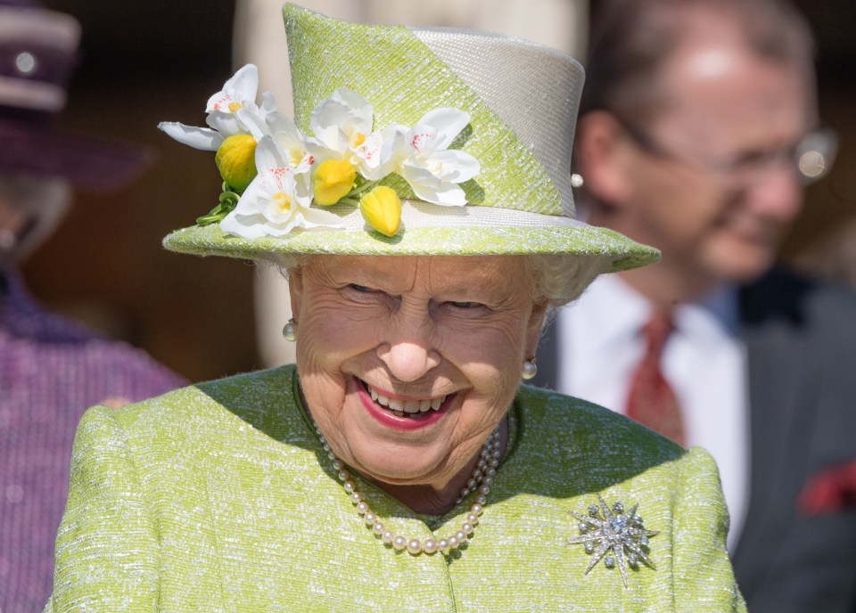  A horse tried to nuzzle the Queen's famous handbag