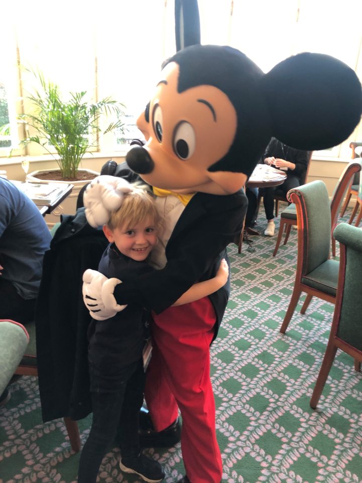  Noah, 7, hugging Mickey Mouse at Disneyland Paris