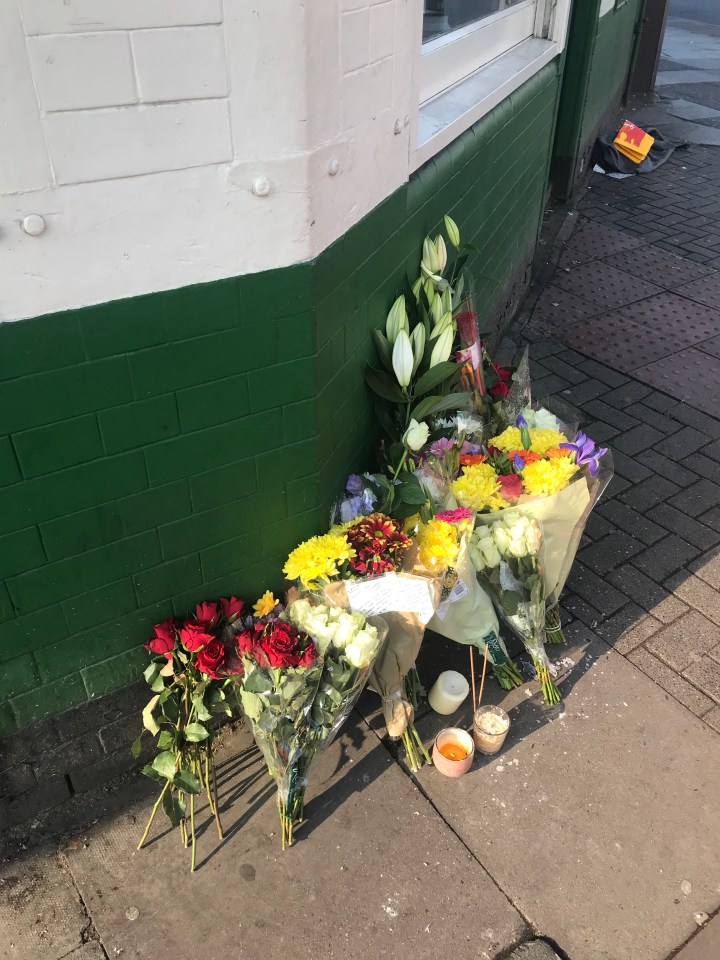 Tributes were left at the scene in Clapham