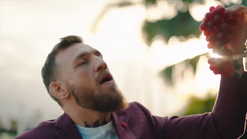 Conor McGregor held a bunch of grapes in his incredibly cheesy fake advert