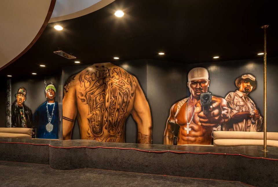  It contains murals of the rapper painted on the walls