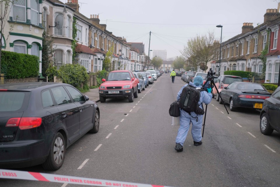  Forensic officers making their way to the scene today