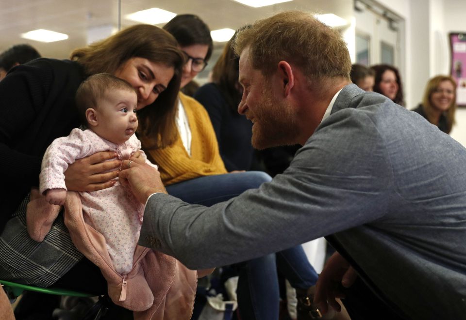  Dad-to-be Prince Harry had earlier cooed over a baby on an engagement on Wednesday