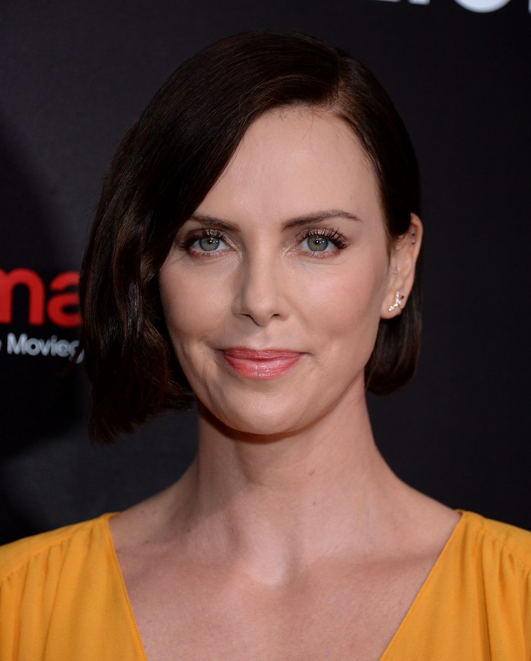  Charlize Theron says that her seven-year-old Jackson, who she adopted as a baby boy, is every bit as much of a girl as his three-year-old sister