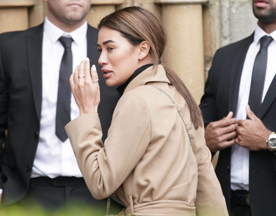  Montana Brown wipes away a tear as she attends the funeral of Mike Thalassitis today