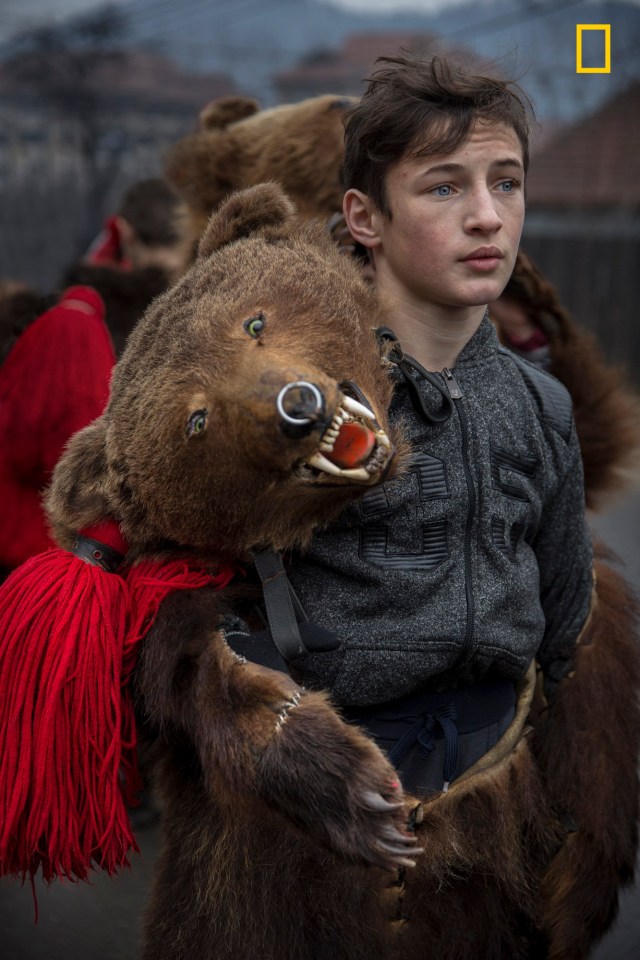  Photographer Mauro De Bettio said: 'Every winter, between Christmas and New Year, in the north-eastern regions of Romania, the annual Dance of the Bears takes place - a ritual that symbolises the death and rebirth of time. Men and women of all ages dress with bear skins and dance to the rhythm of flutes and percussion to drive away evil spirits and welcome the New Year.'