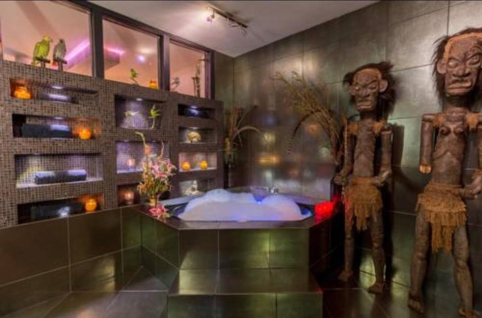  Why not have a bath while joined by some creepy statues?