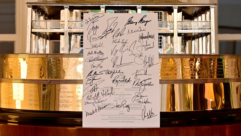  All the champions signed a menu at the dinner on Tuesday night