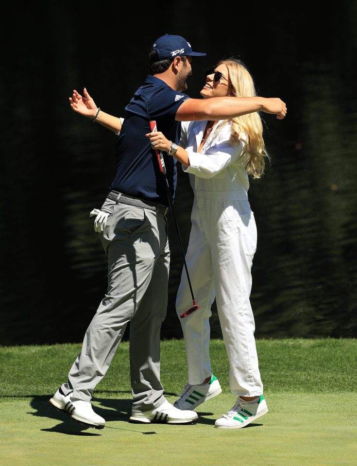  Jon Rahm hugs his girlfriend Kelley Cahill during the par-three contest