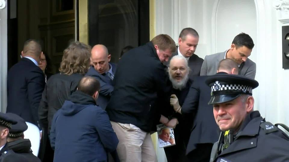  Julian Assange was dragged out of the Ecuadorian Embassy by cops after they withdrew asylum status on Thursday