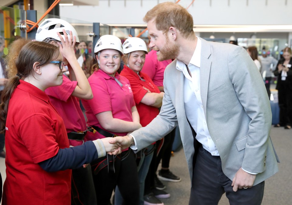  Prince Harry greeted local youngsters as he opened the centre in Dagenham