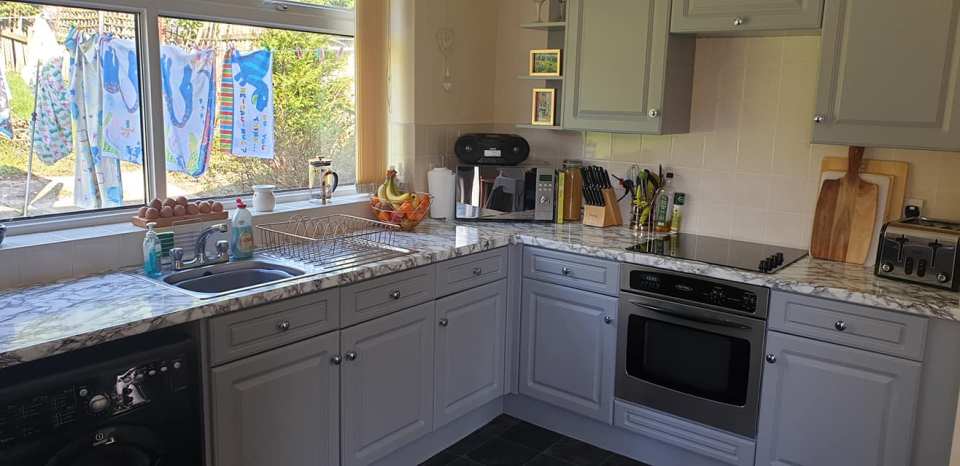  She spent under £60 on paint on vinyl work top coverings and was able to breathe new life into her kitchen