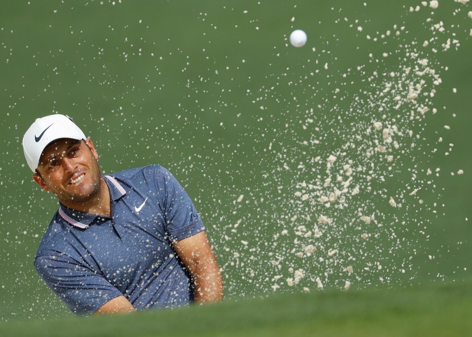  Francesco Molinari plays out of a bunker on his way to a 67