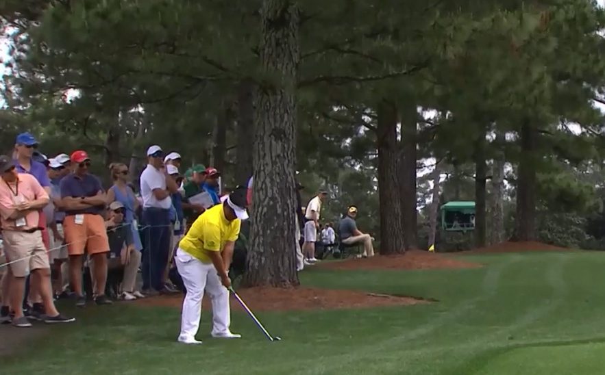  Thai golfer Kiradech Aphibarnrat prepares to hit his recovery from the trees