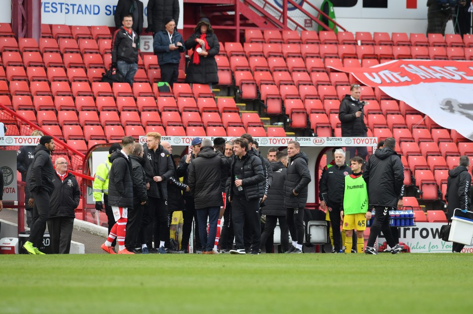 A photo from the game shows tempers reaching boiling point on the touchline