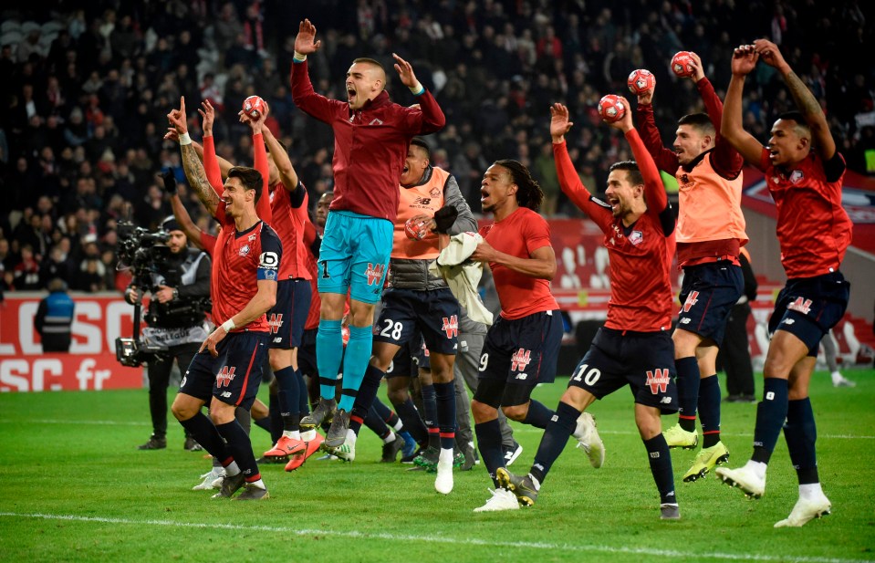 Lille players celebrate after thrashing PSG