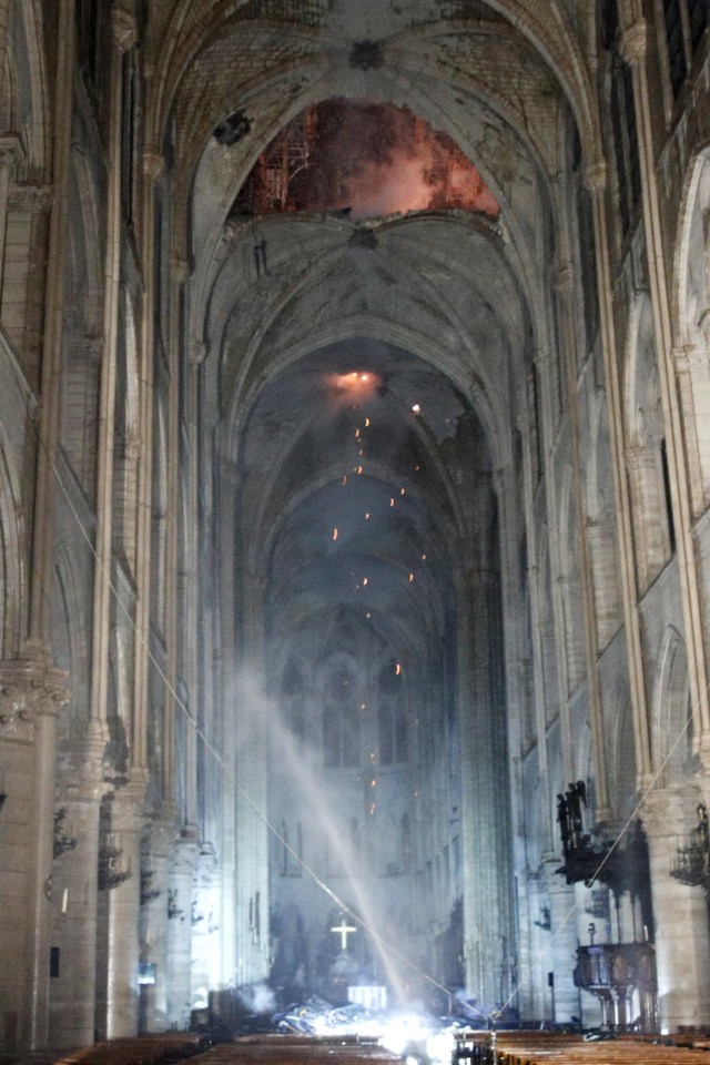 Upsetting images smoke-filled interior of the iconic building