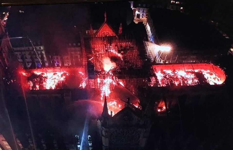  An aerial shot shows how the fire ripped through the centuries-old roof