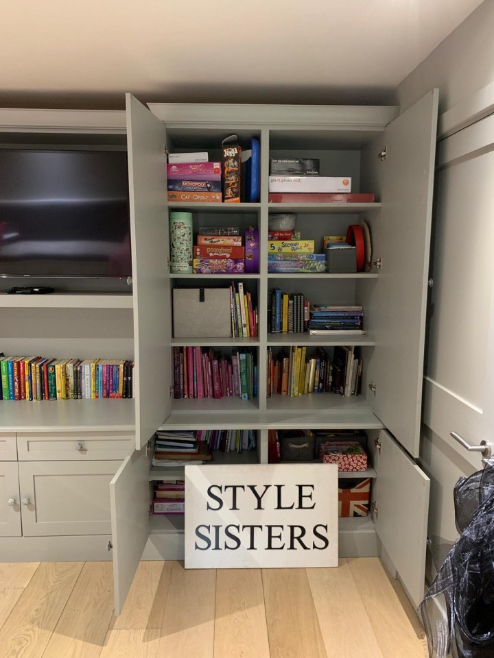 The games and book cupboards were arranged to look neat and tidy