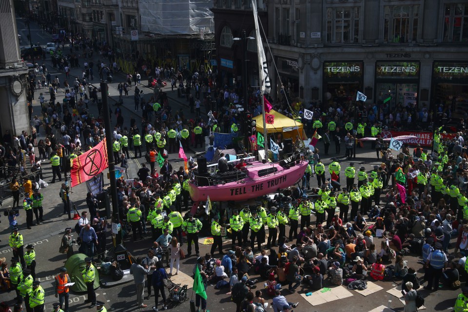  Demonstrators massed around the pink protest boat carrying Dame Emma yesterday