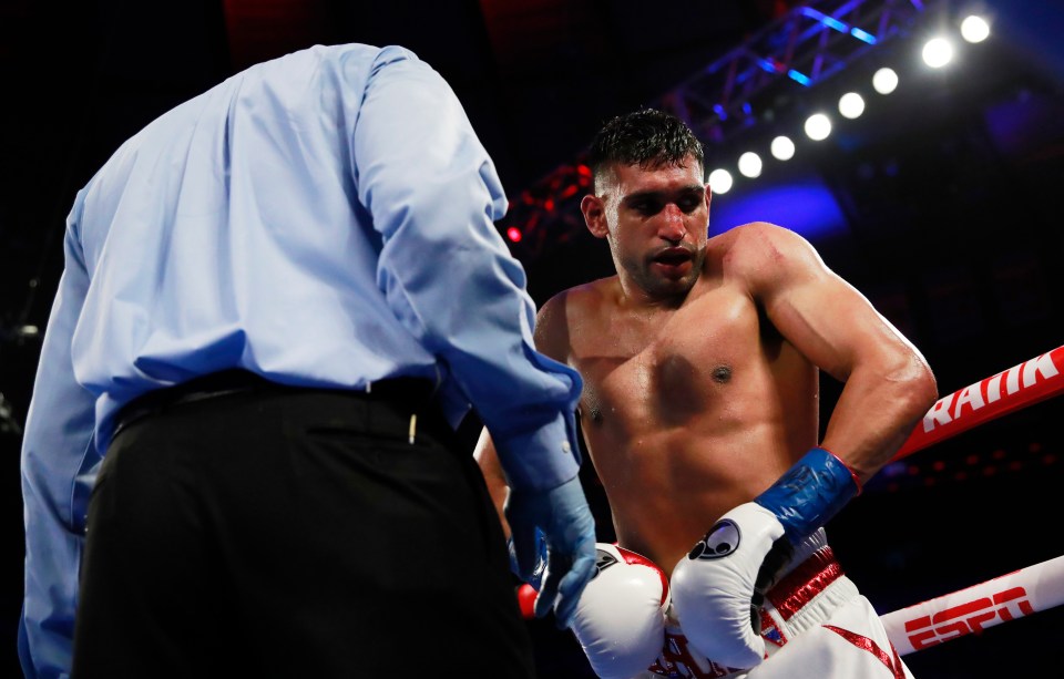 Khan lost the fight by technical knockout