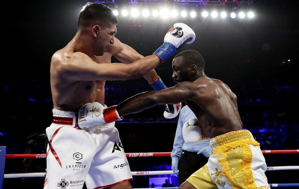 Crawford hit Khan with an accidental low blow and the Bolton man was unable to continue 