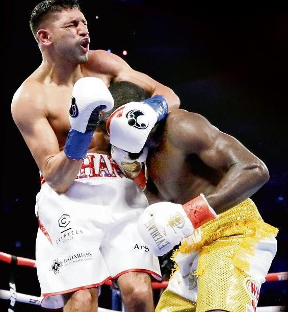 Amir Khan says he cannot bow out of boxing with the low blow that ended his crack at Terence Crawford's world title 