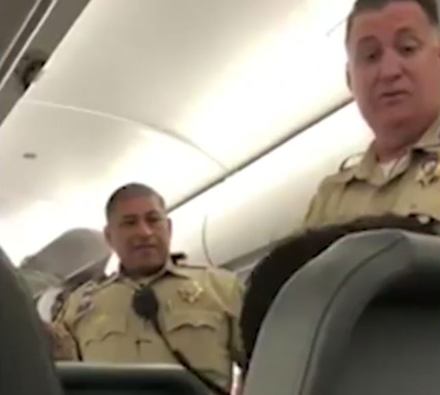 Police then boarded the flight and accused her of trespassing