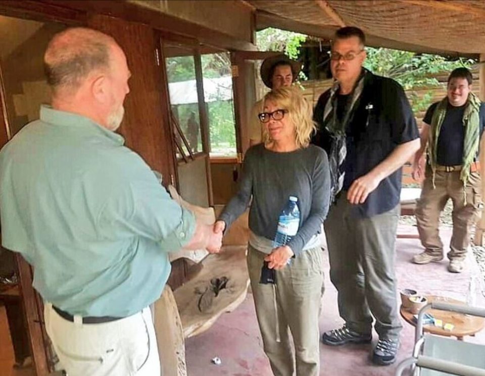 She appeared to be in shock as she shook the hand of Wild Frontiers Uganda director Paul Goldring