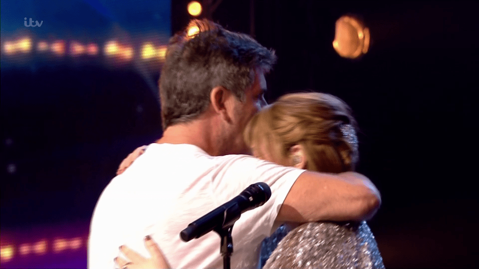  Simon was on hand to give SuBo a hug after her incredible performance