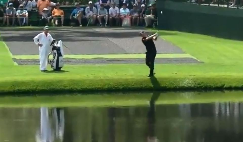  Matt Wallace tees off beside the lake of the 16th green at Augusta