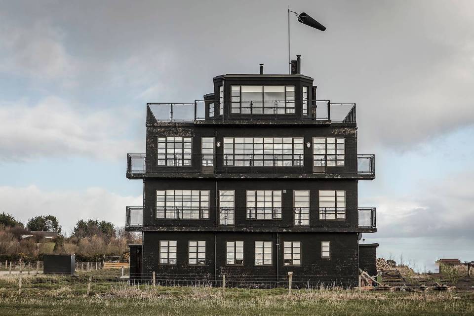 This restored air control tower offers a unique industrial design