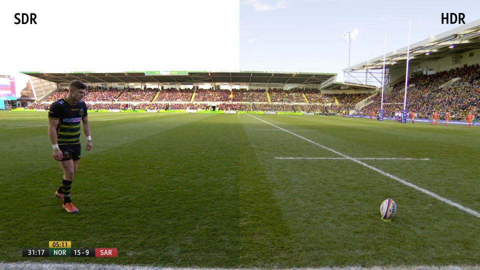  Here's a comparison between HDR and SDR. HDR brings out more colour from the picture, meaning you get a crisper sky and can pick out individual fans in the stands