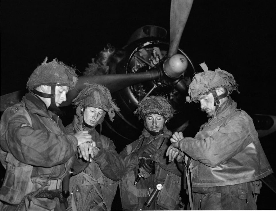  Pathfinder officers of the 22nd Independent Parachute Company at Harwell on June 5, standing in front of a C-47 waiting to take them to France