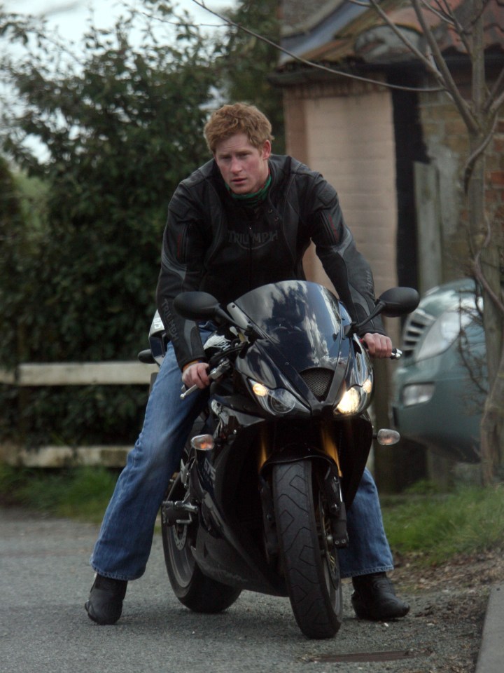 Prince Harry rides his Triumph motorbike in Norfolk on March 29 2009