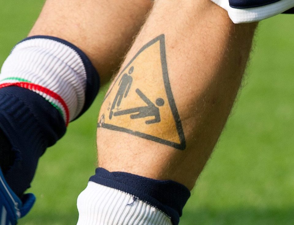 De Rossi's tattoo depicts exactly what his game was all about