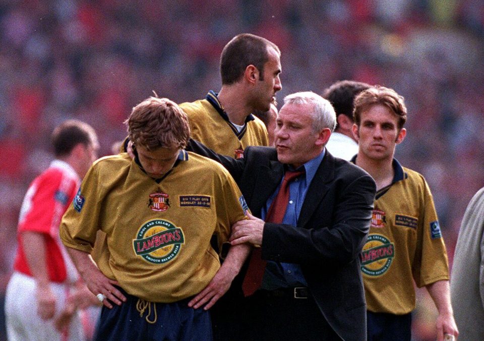  Michael Gray is consoled by boss Peter Reid after missing the decisive penalty in the Division One play-off final