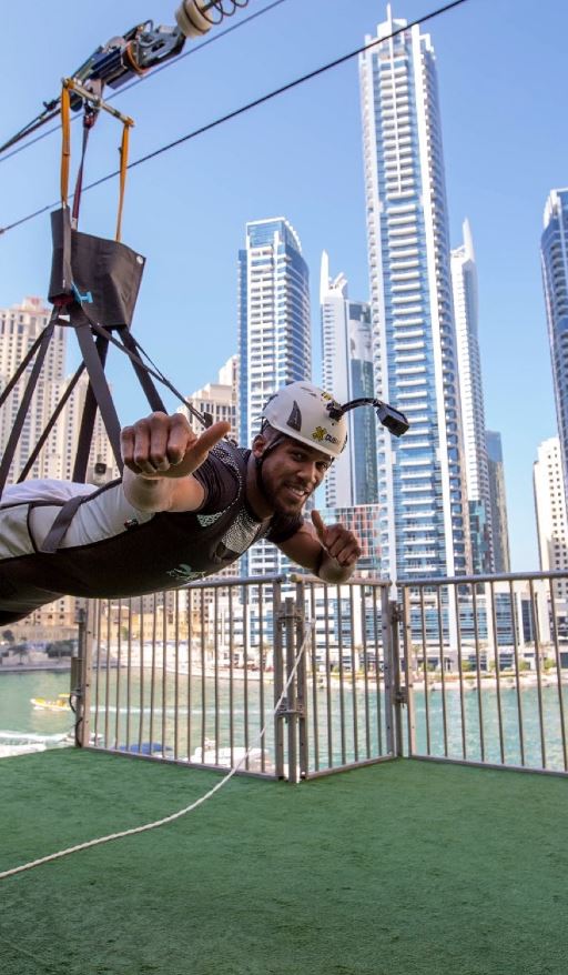 AJ takes a ride on the XLine zipline in Dubai as he enjoys living the fun life