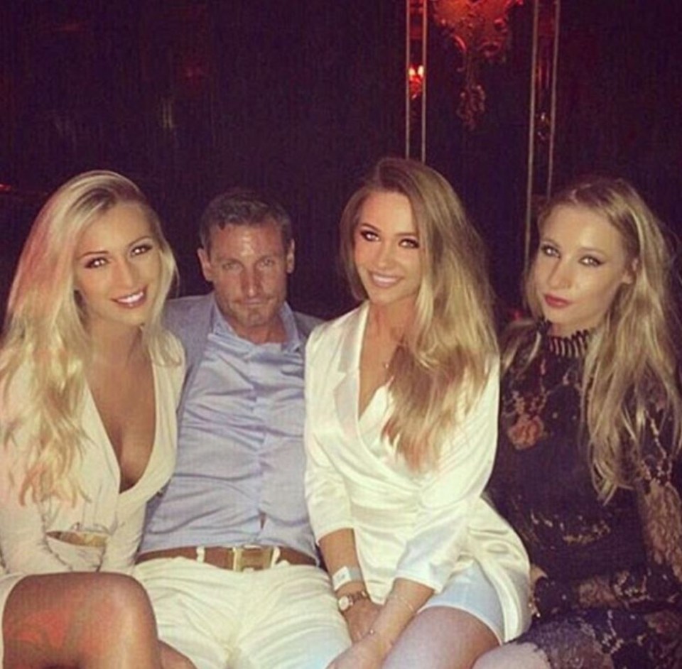 Dean poses with his twin daughters Chloe and Charlotte and lookalike ex-girlfriend Rebekah Rose-Ward