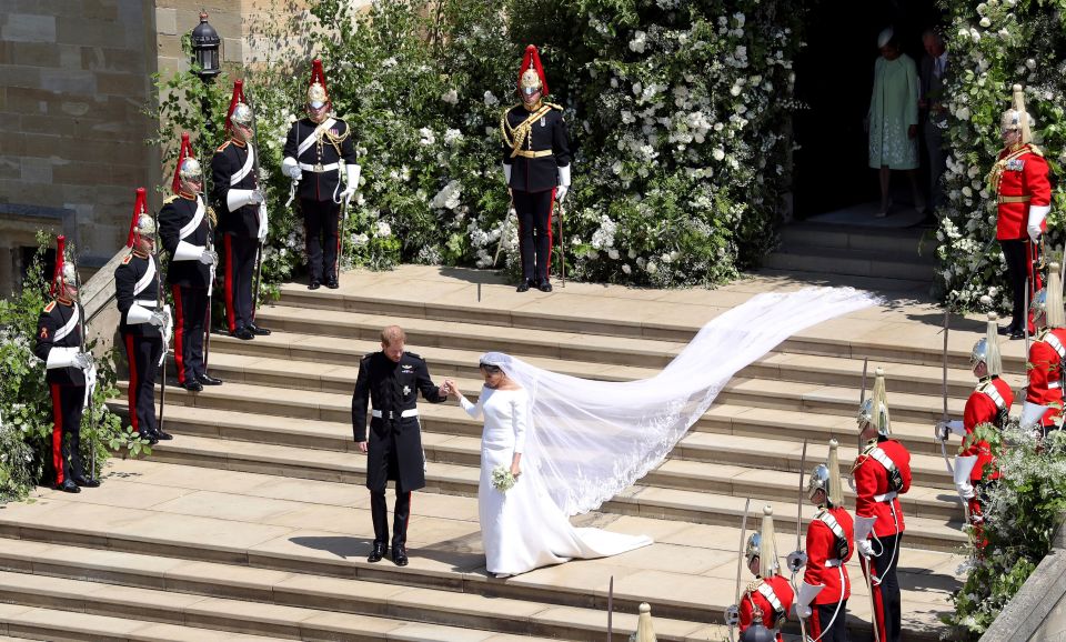  The bride and groom leaving the church