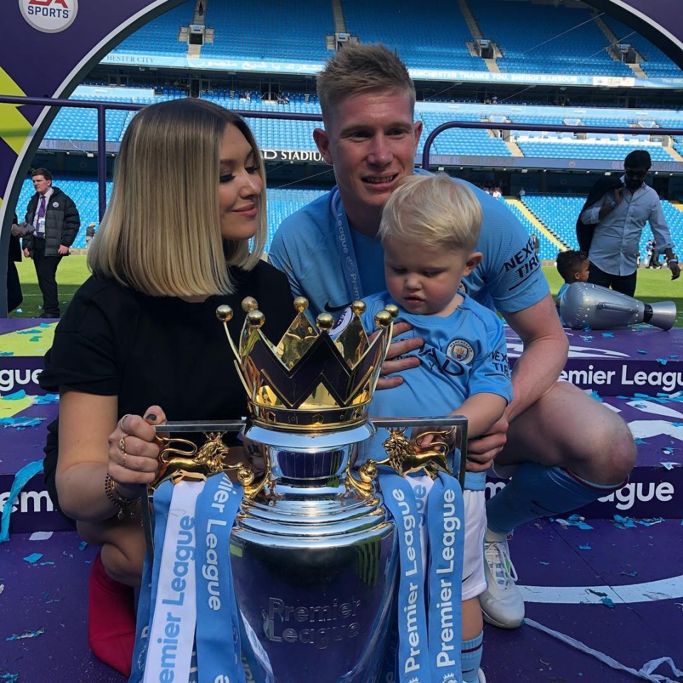  Kevin and Michele De Bruyne pictured with the Premier League title in 2018