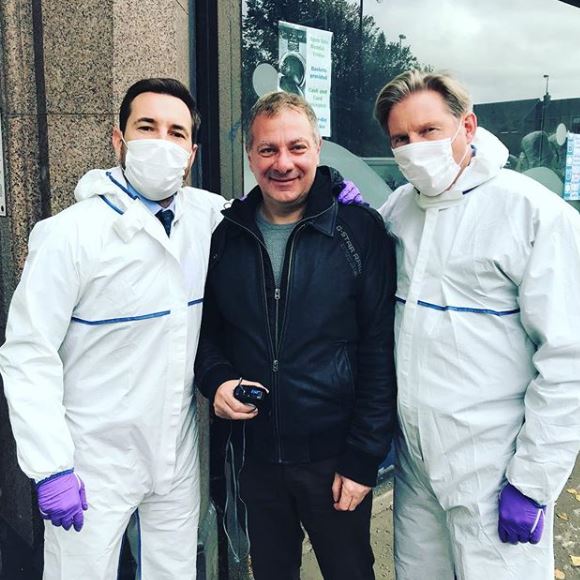 Jed flanked by masked Martin Compston and Adrian Dunbar