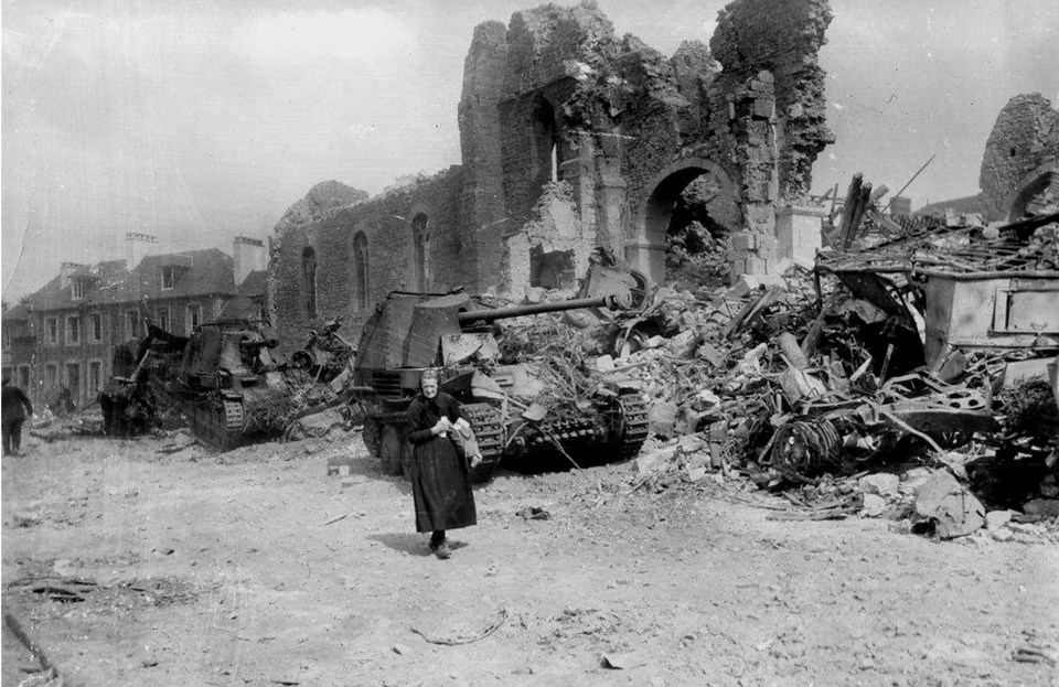  In a decimated town a battery of tank destroyers have been taken out of action