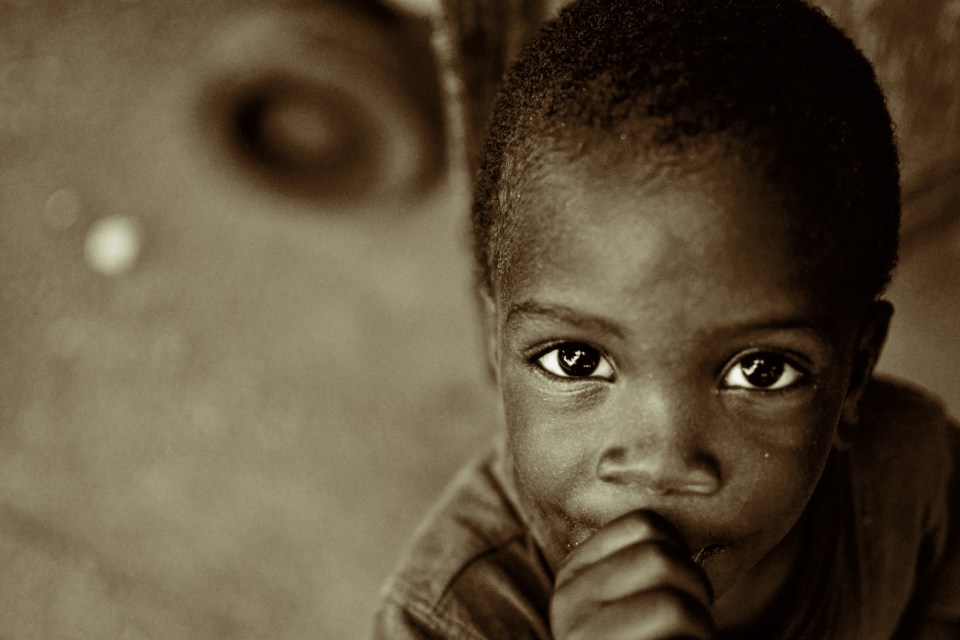  A child in Negirl, Jamaica, looks into the camera