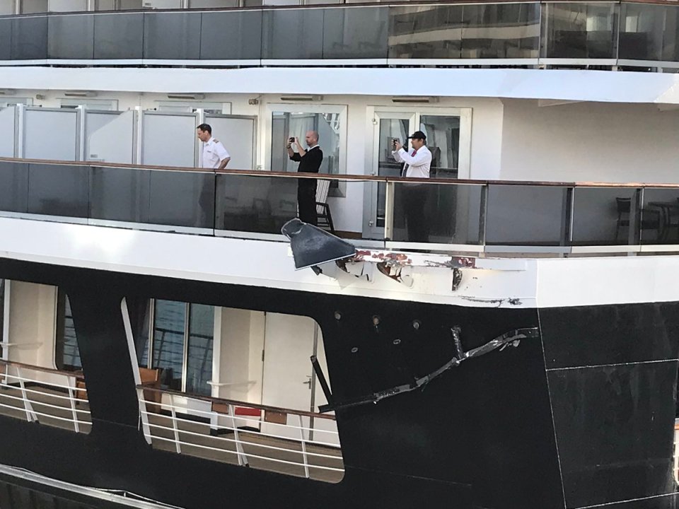 Passengers on both ships were seen on their balconies