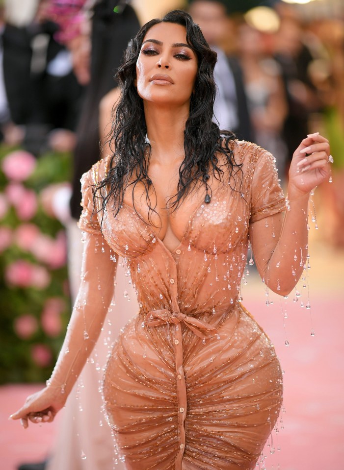 Kim Kardashain's rain-drop illusion dress turned many heads on the pink carpet