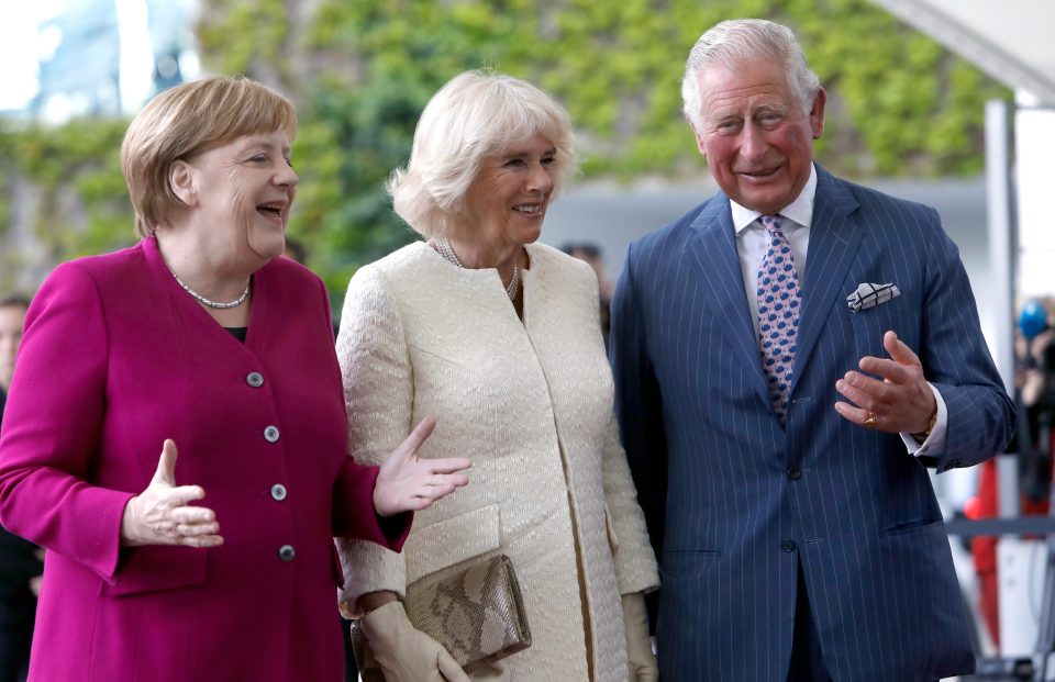  The jovial trio head off for a meeting in Merkel's private study