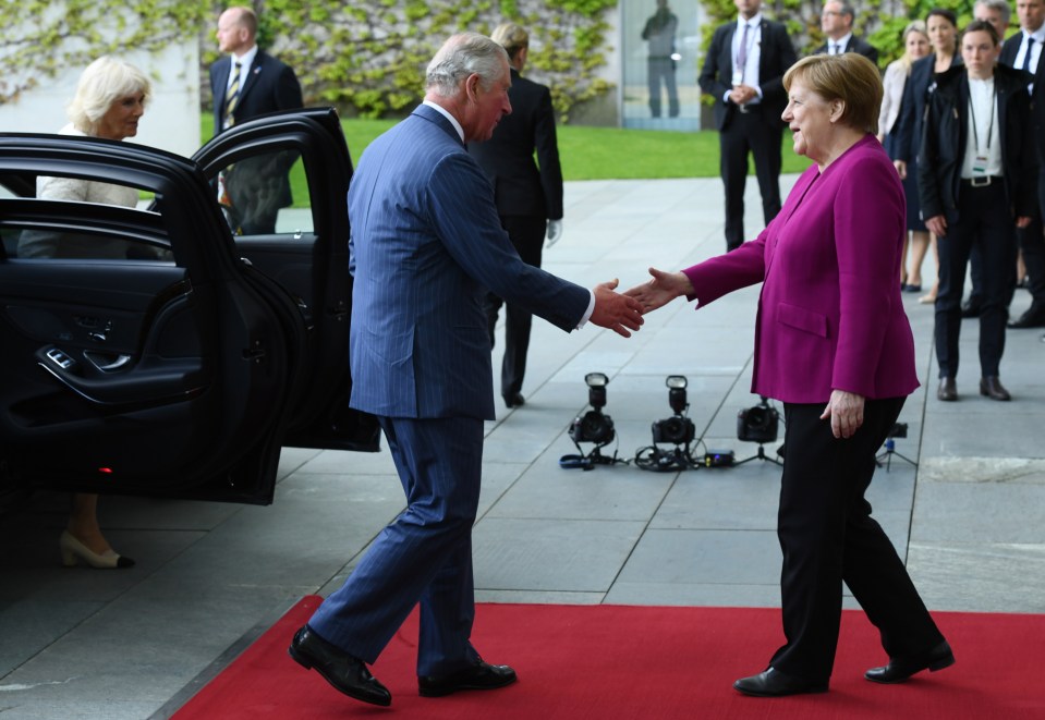  German Chancellor Angela Merkel welcomes Britain's Prince Charles and Camilla, Duchess of Cornwall, at the chancellery